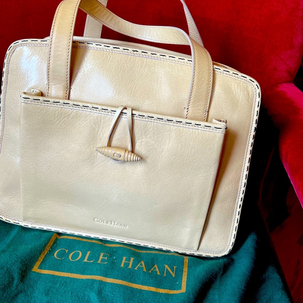 Cole Haan smooth leather crossbody bag with front. Beautiful detail